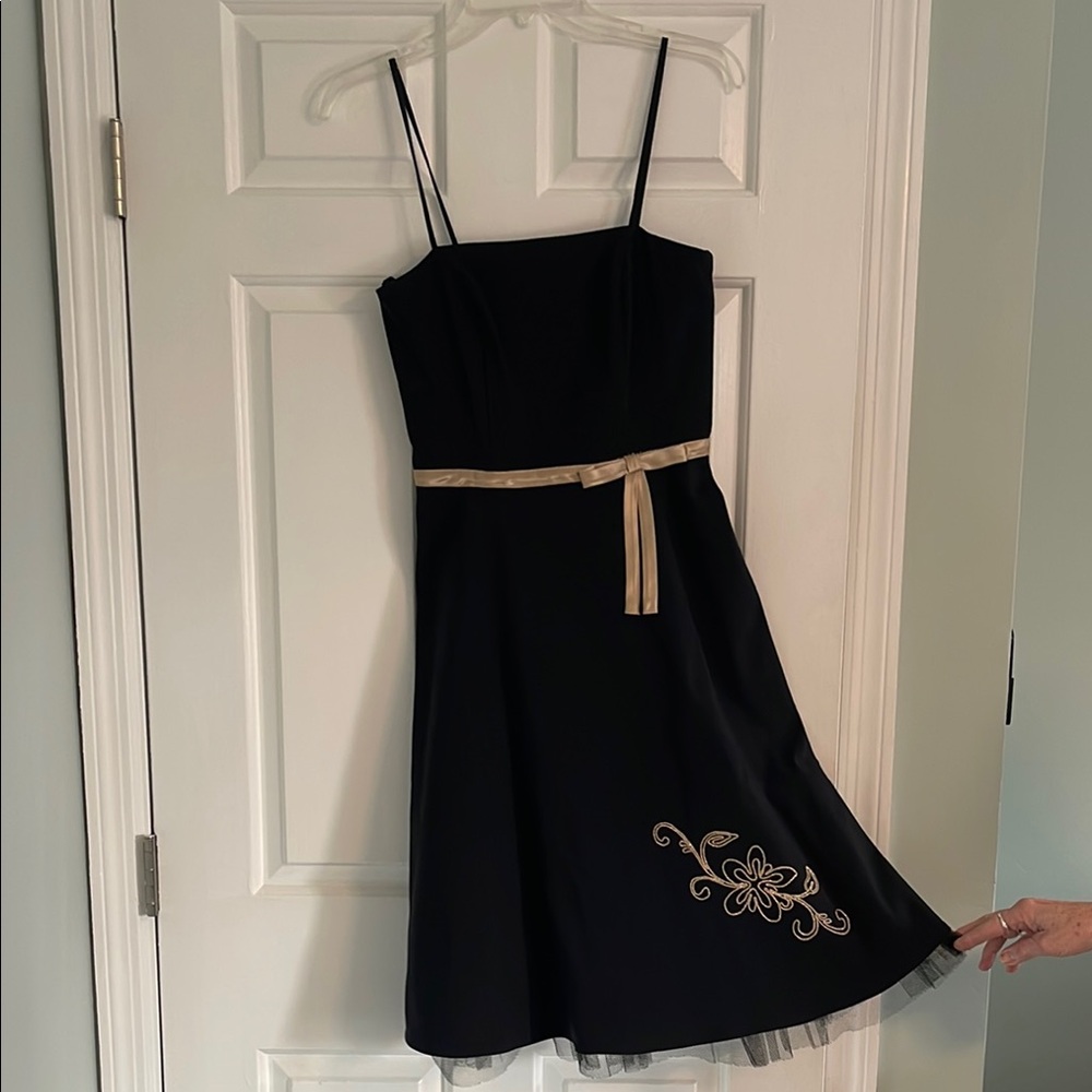 Elegant Black Dress with Gold Accents